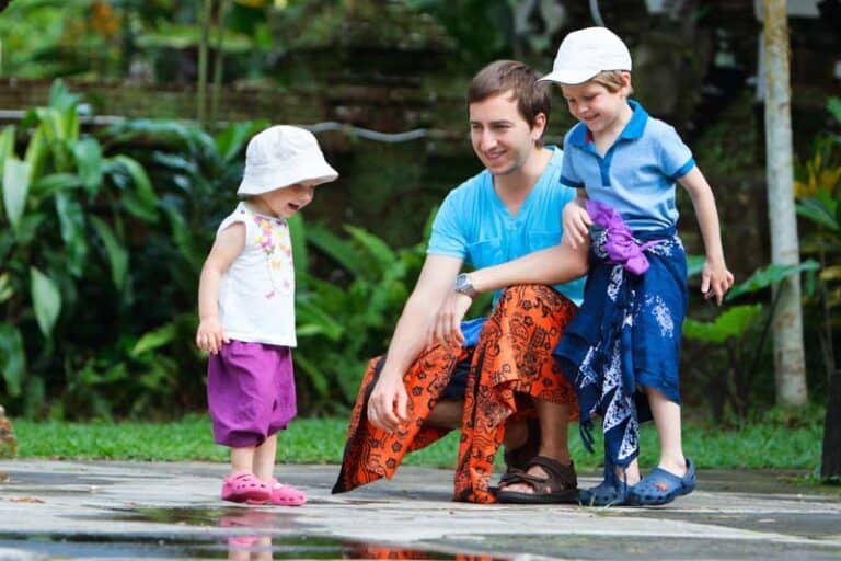 Img father and two kids bali temple