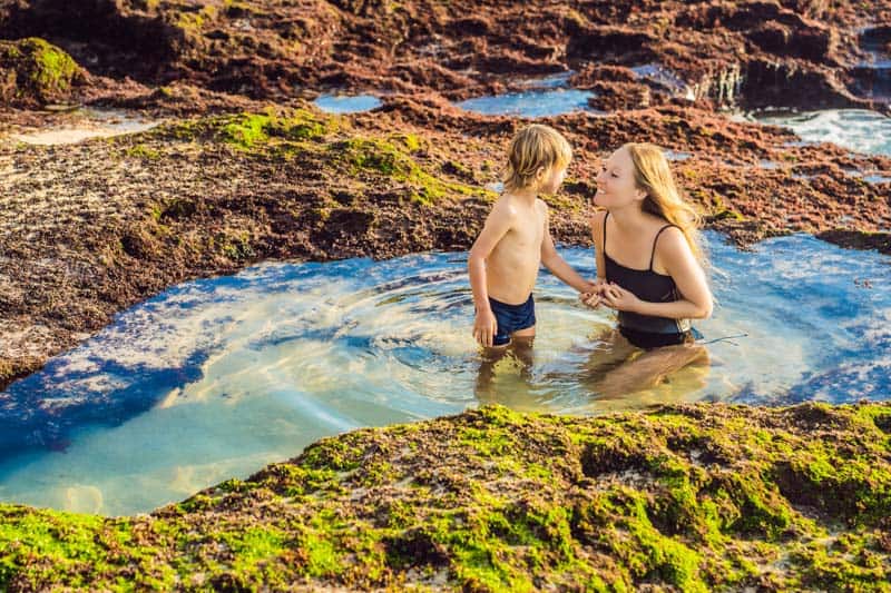 Img Mother And Son Tourist Tegal Wangi Beach